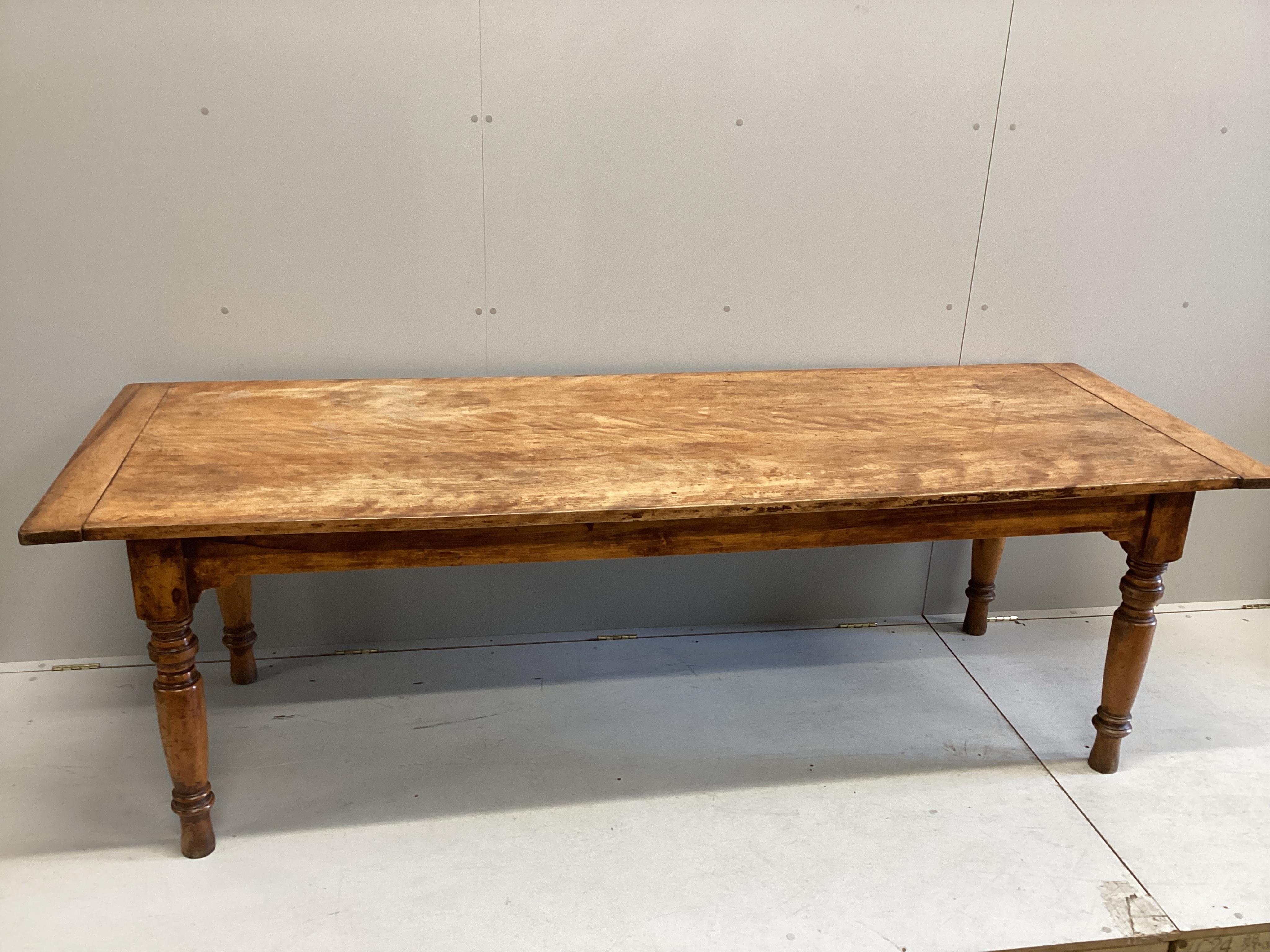 A 19th century rectangular birch kitchen table, width 233cm, depth 80cm, height 73cm. Condition - fair